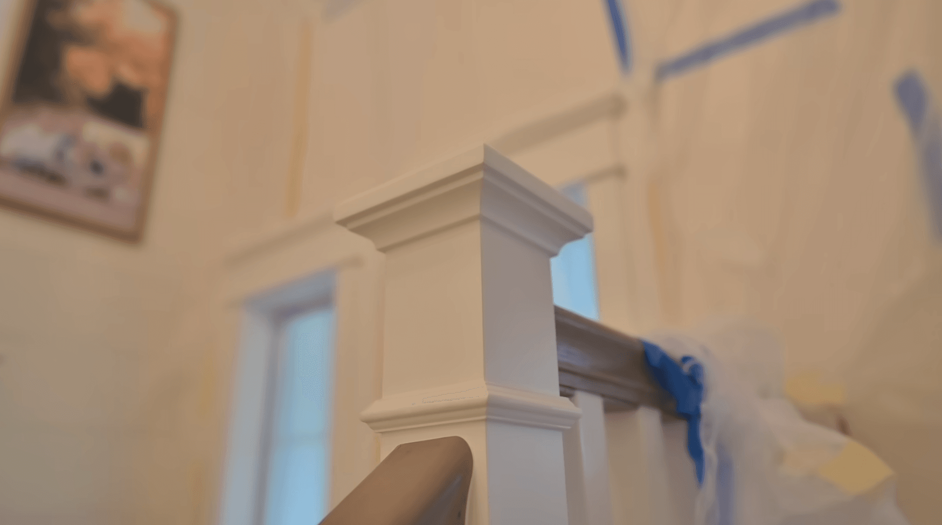 Custom stair newel post and railing detail by Field & Beam